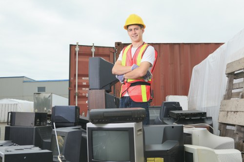 Office furniture being removed by clearance service